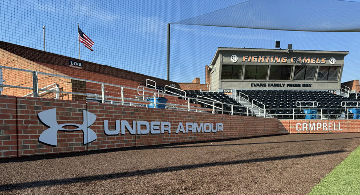 Custom Backstop Padding with Graphics at Jim Perry Stadium by Field Wall Pads