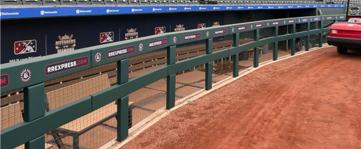 Custom Dugout Rail Padding With Graphics at Dell Diamond by Field Wall Pads